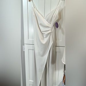 Ivory evening gown. New with tags never worn.